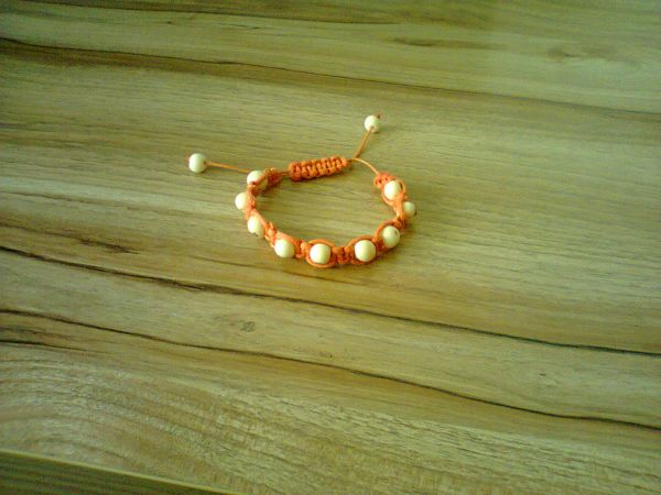 pulseira shambala semente laranja