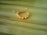 pulseira shambala semente laranja