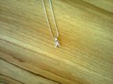 colar menino strass